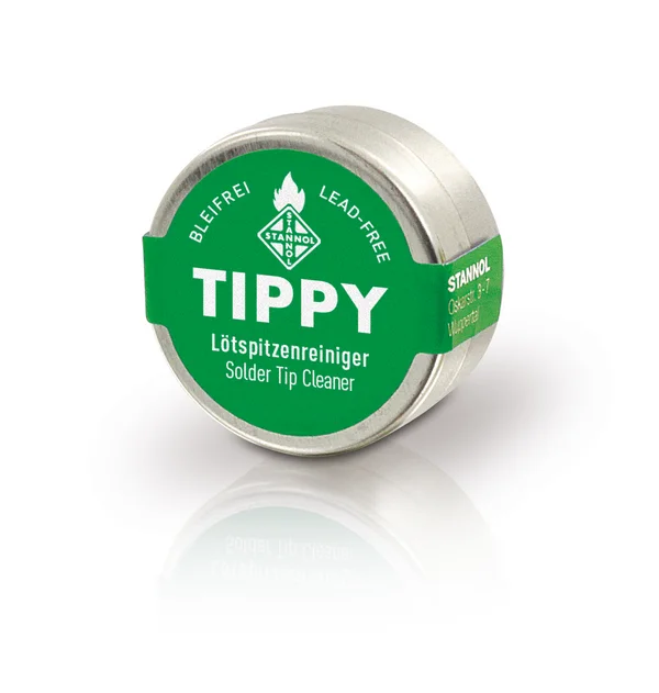 Auf dem Bild ist eine kleine, metallene Dose mit grünem Label zu sehen. Darauf zu lesen ist Stannol Tippy Lötspitzenreiniger.